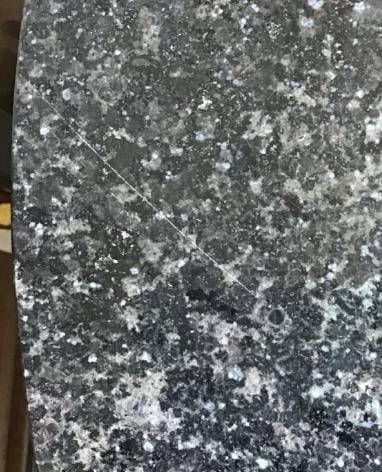 Mesa de centro Interdesign cubierta granito y estructura metálica