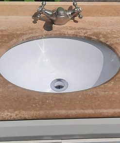 Vanitorio con cubierta mármol traventino