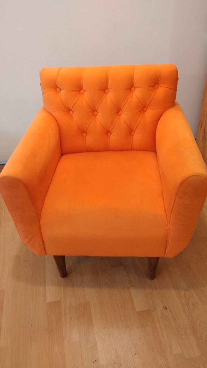 Sillón capitone naranja