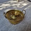 Brasero de bronce con asas
