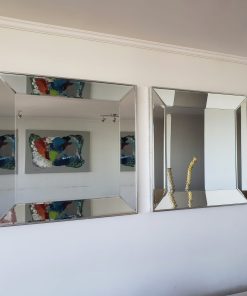 Par de espejos marco biselado