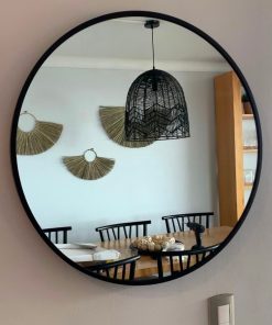 Espejos redondos negros y dorados