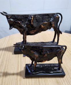 Vacas de resina decorativas