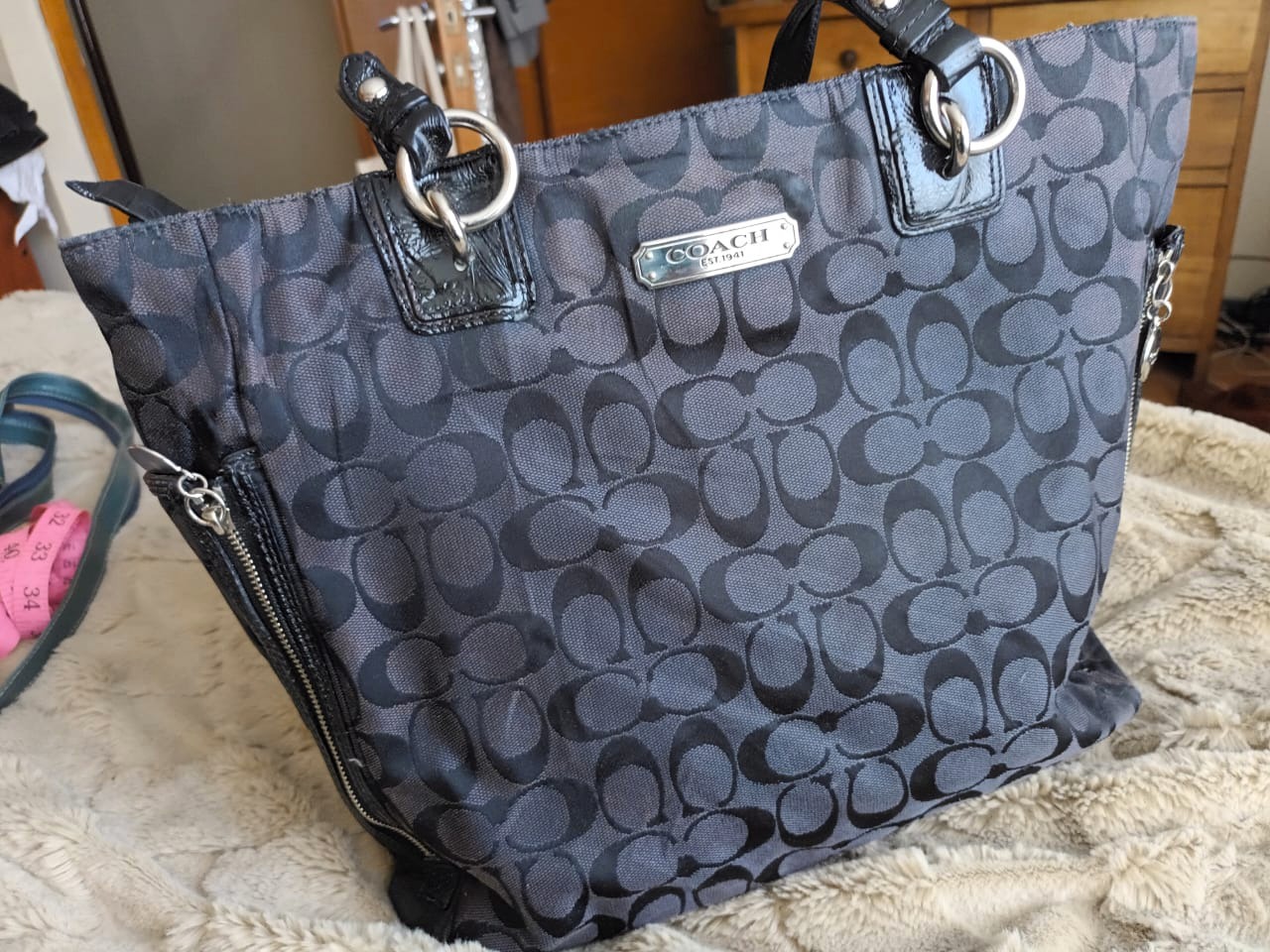 cartera coach de hombre