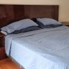 Respaldo super king y 2 veladores Rosen