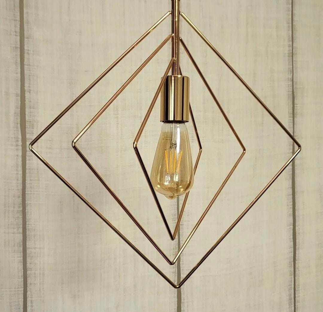 Lámpara de colgar Abitare dorada