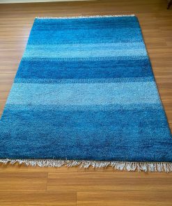 Alfombra de lana gruesa tonos azules