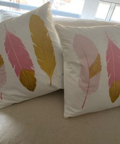 Par cojines diseño plumas