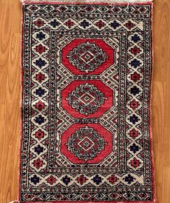 Alfombra lana fina tonos rojos