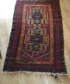 Alfombra tonos rojo y amarillo