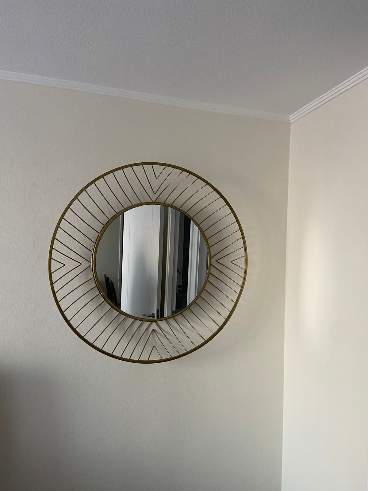 Espejo metálico dorado Ashley