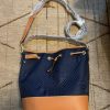 Cartera Estee Lauder