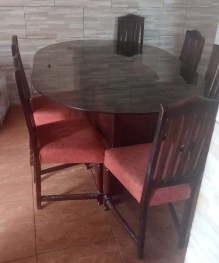 Juego comedor vidrio y 6 sillas