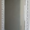 Espejo de pared borde plateado