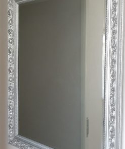 Espejo de pared borde plateado