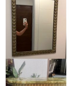 Arrimo y espejo de ónix con bronce