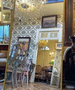 Espejo arqueado dorado metálico