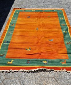 Alfombra tonos naranjo y verde