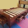 Cama 1 plaza de madera Raulí con cajones