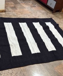 Alfombra lana blanco y negro