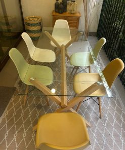 Juego de comedor vidrio con 6 sillas eames