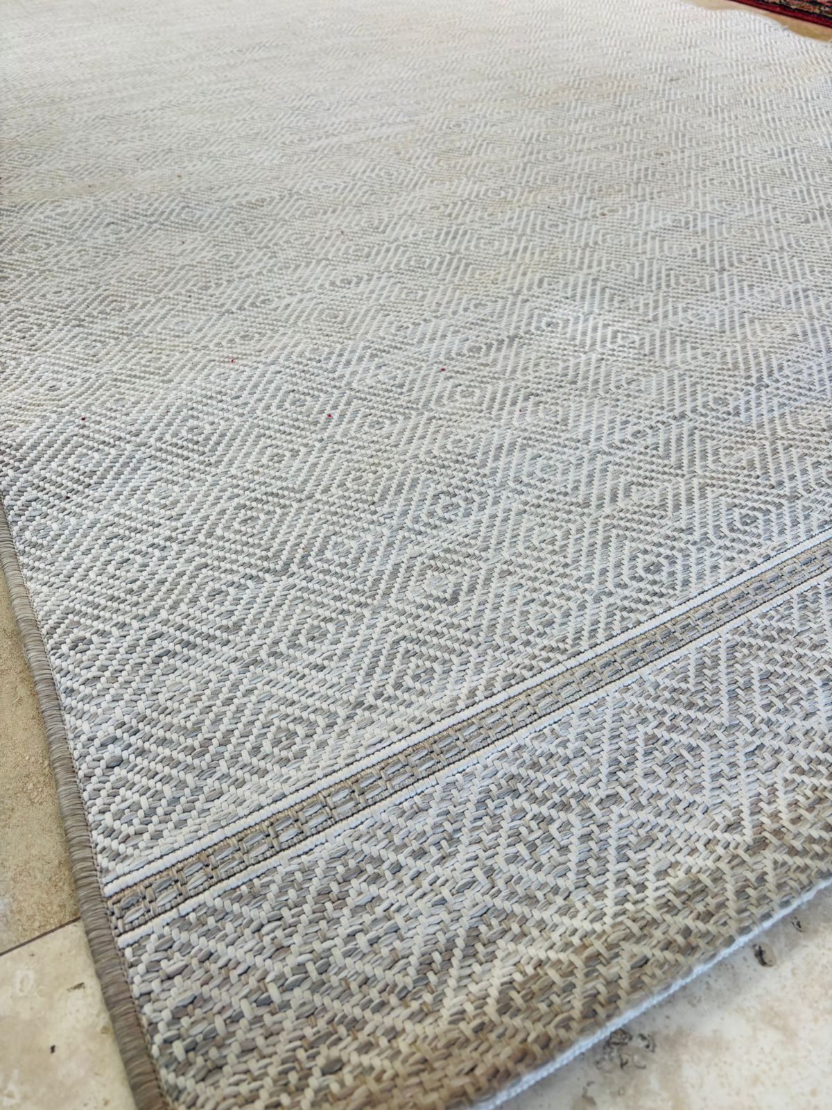 Alfombra Zara Home lana gris