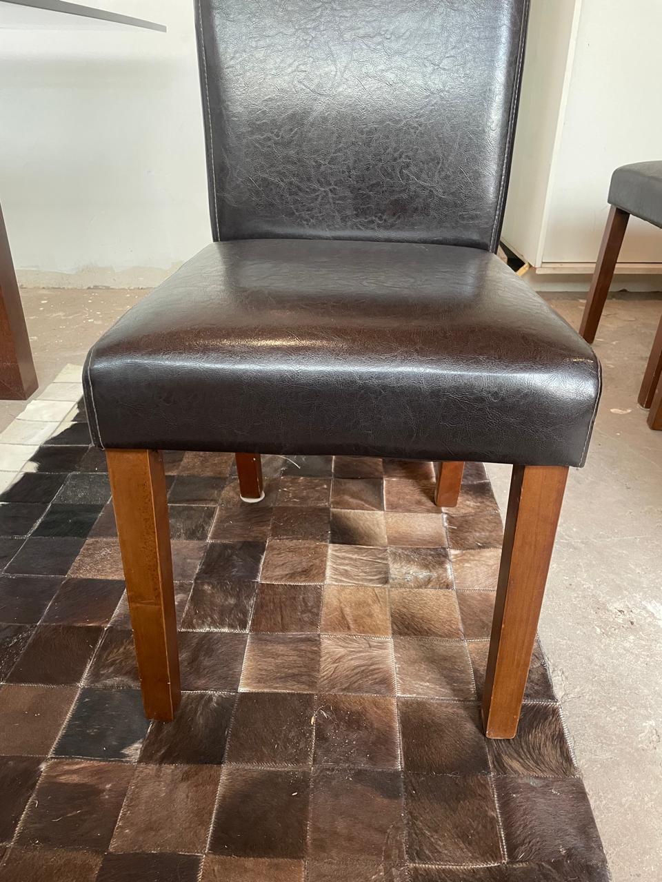 Juego de comedor vidrio con 8 sillas cuero cafe - Imagen 2