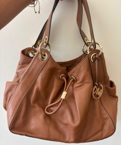 Cartera cuero café Michael Kors