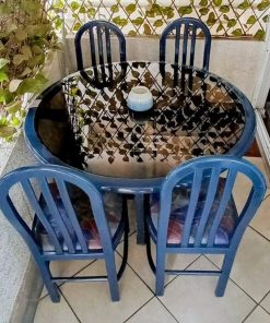 Juego de comedor redondo con 4 sillas azul