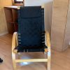 Sillón madera y tela negra