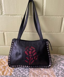 Cartera cuero con tachas