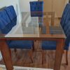 Juego de comedor raulí vidrio con 6 sillas azules raulí