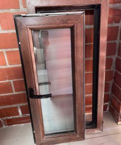 Ventana PVC termo panel abatible café