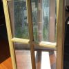 Espejo ventana dorado