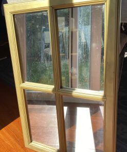 Espejo ventana dorado