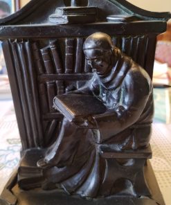 Figuras sujeta libros fierro antiguas forma de monjes leyendo