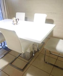 Juego de comedor con 6 sillas blancas cromadas