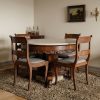 Juego comedor caoba y mármol con 6 sillas
