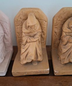Soporte monjes apoya libros