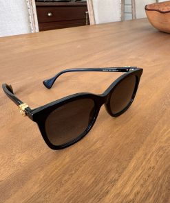 Lentes de sol Gucci negros