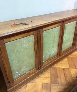 Mueble buffet 4 cuerpos madera y cuero verde