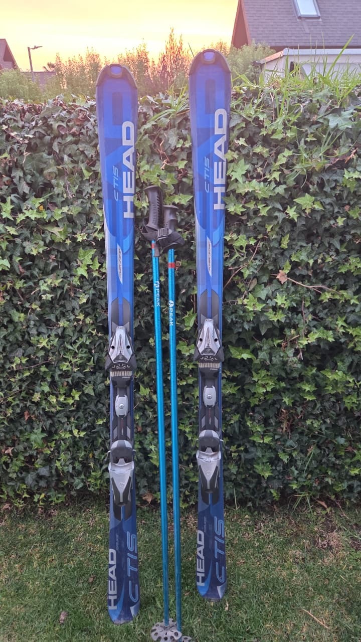 Skis Head azules CTIS con bastones
