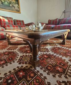 Mesa de centro madera cubierta vidrio
